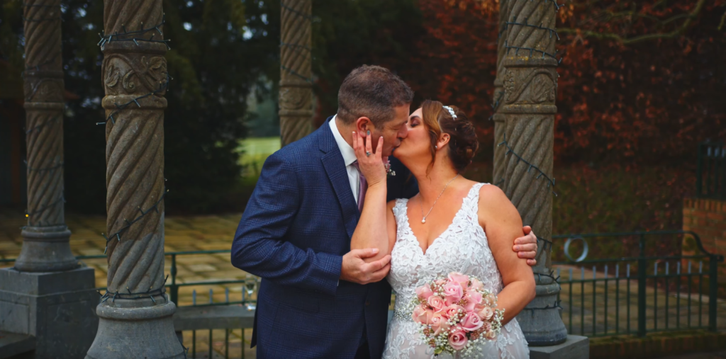 A still from Sarah and Andy's wedding film, filmed during the couple's intimate poses at Weston Hall